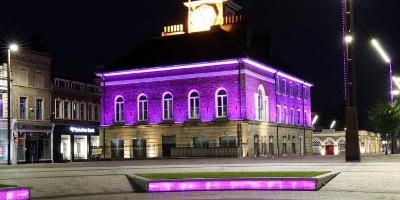 Image of Stockton's town hall lit up purple