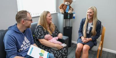 Sean and Hannah McKenzie registering their new baby Lyla with Registrar Maddie Burn at Stockton-on-Tees Registry Office