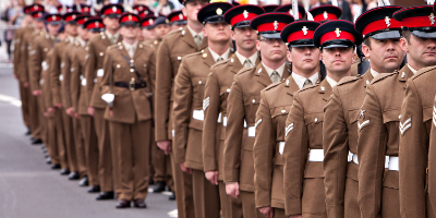 Armed Forces personnel parade along Stockton High Street at a previous Armed Forces Day event