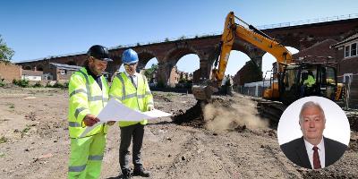 L/R Site Foreman Dave Nappy and Darren Porteous Highways Supervisor study plans while excavator digs at new site of Yarm long-stay car park