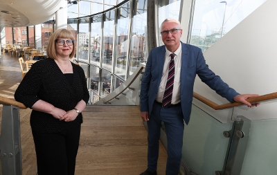 Annabel Turpin, Chief Executive and Artistic Director at ARC,  and Councillor Steve Nelson stood at the top of stairs at ARC.