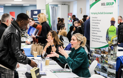 An image showing a busy room at an Employment and Training Hub jobs fair