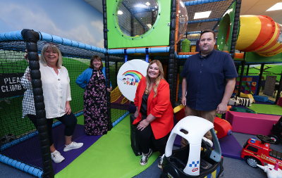 An image of Councillor Lisa Evans alongside staff at the Playground in Thornaby